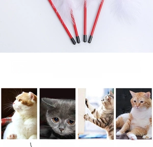 Detail of red cat wand toy featuring white feathers and a sturdy plastic handle
