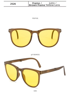 Detail view of oval tea frame sunglasses with yellow lenses and silver rivets decoration