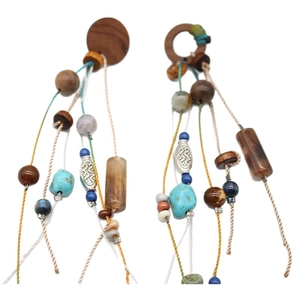 Bohemian silver needle earrings with wood beads, stones, and circular tassels in ethnic style