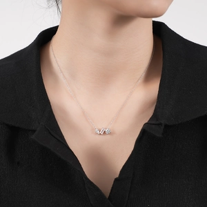 925 sterling silver necklace with three-stone zircon pendant worn on a model