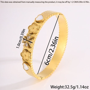Detail of gold titanium steel bangle showing dimensions, heart motifs, and floral patterns