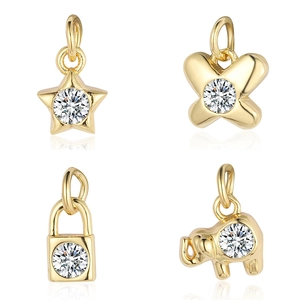 Golden copper charms set featuring star, butterfly, lock, and elephant shapes with zircons