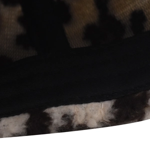 Close-up of leopard mesh and faux fur lining details on the corduroy baseball cap