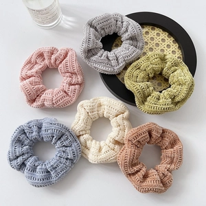 Set of 6 knitted ribbed scrunchies in pastel colors for high ponytail hairstyles