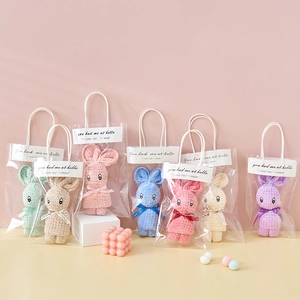 Coral fleece towel gift set shaped like rabbits in various colors with tote bags