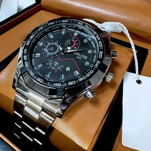 Men's quartz watch with silver steel strap, black dial, and luminous tachymeter display
