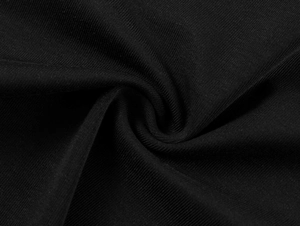 Macro shot of black Tencel Lycra fabric texture showing softness and drape quality