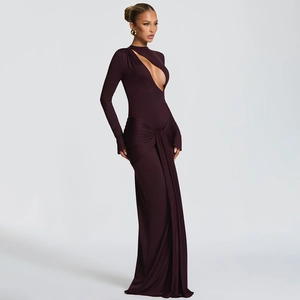 Detail view of purple evening gown featuring chic cutout chest and waist draping