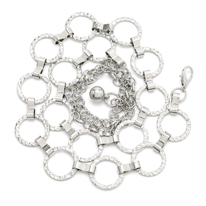 Silver metal chain belt with textured rings, ball pendant and lobster clasp on white background