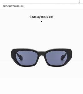 Front view of black geometric cat eye sunglasses with thick frames and dark lenses