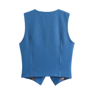 Back view of a blue vest with leopard print lining, flat lay on white background