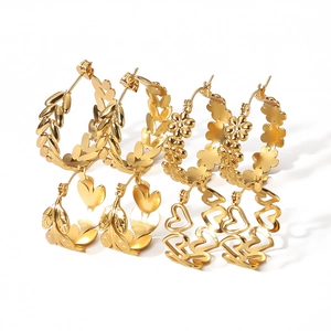 Set of four 18k gold plated stainless steel hoop earrings with leaf and flower motifs