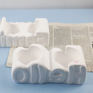 Detail of Hello and Family letter silicone molds for DIY candles and plaster crafts