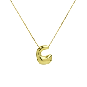 Macro shot of 18K gold plated puffy bubble letter C pendant on a delicate chain