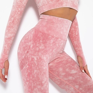 Women's pink acid wash seamless yoga set with long sleeve crop top and high waist leggings