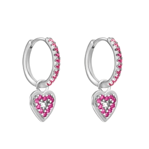 Detailed close-up of heart-shaped silver earrings with vibrant rose red zircon crystals