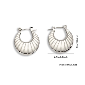 Detail view of silver textured hoop earrings with dimensions 2.7cm height and weight 12.9g
