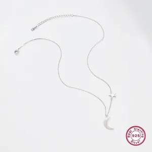 Minimalist S925 sterling silver necklace featuring star and moon pendants in high polish