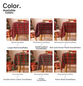 Detail view of various Christmas tablecloth styles with red and green snowflake patterns