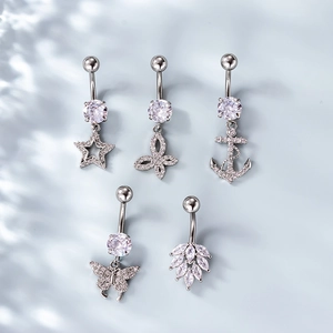 Set of five stainless steel belly rings with star, butterfly, and anchor zircon pendants