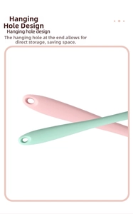 Detail view of pink and green silicone ladles featuring round hanging holes for storage
