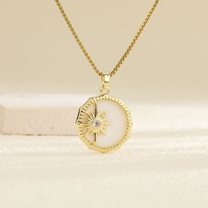 Titanium steel necklace with gold starburst pendant and white shell inlay for women