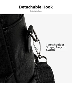 Detail of silver detachable hooks and lychee leather texture on a black backpack