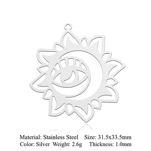 Detail view of silver stainless steel sun and eye pendant with 31.5x33.5mm dimensions