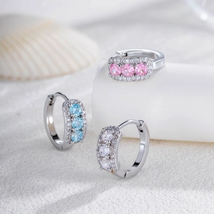 Vintage geometric silver earrings with pink, blue and white zircons on seashell