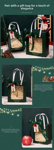 Detail of green Christmas gift bag with transparent window, ribbon, and elk tag