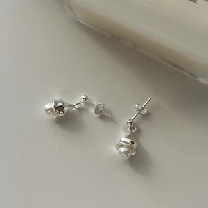 Elegant 925 sterling silver pearl drop earrings featuring minimalist bell-shaped caps