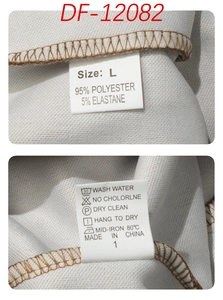 Detail of fabric care label showing 95% polyester and size L on gray knitted men's set