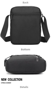 Detail showing the flat bottom structure and back zipper pocket of the black messenger bag