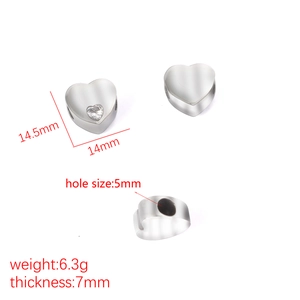 Polished stainless steel heart charm with crystal inlay and dimension measurements