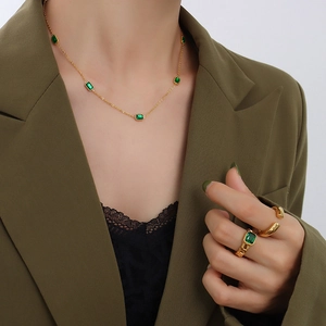 Vintage 18K gold plated titanium necklace and rings set with emerald green zircon