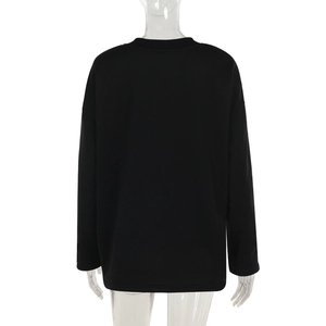 Detailed back view of casual oversized long-sleeved crewneck sweatshirt in matte black