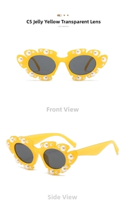 Detail view of jelly yellow cloud-shaped sunglasses with faux pearl embellishments