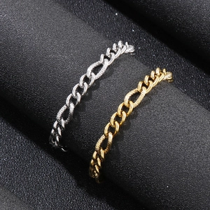Men's hip-hop cuban link rings in silver and gold steel finish on a dark background