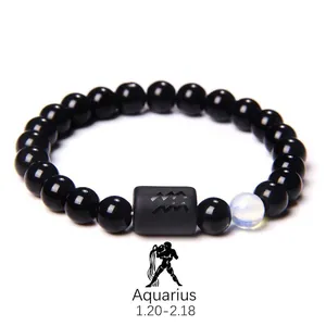 Detailed view of Aquarius black obsidian bracelet with frosted zodiac cylinder bead