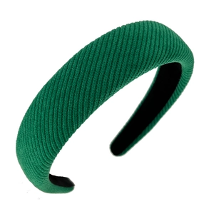 Green textured fabric wide headband for women featuring a minimalist retro style