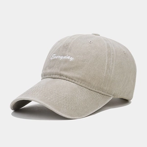 Close-up of Everyday embroidery on washed cotton vintage baseball cap in khaki