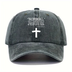 Detail showing the white printed cross and religious text on washed black baseball cap