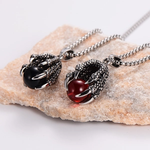 Vintage stainless steel dragon claw pendant necklace with black and red beads set on stone