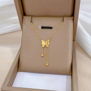 Golden titanium steel butterfly necklace with tassels in a premium jewelry gift box