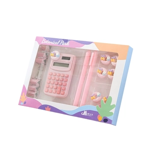 Cute pink macaron stationery set including a calculator, pens, and donut paper clips