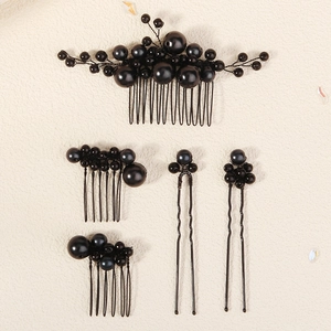 Detailed set of five black pearl hair combs and pins with elegant hand-woven wire design
