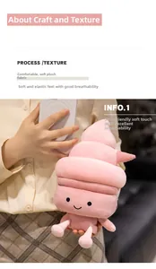 Detailed view of pink ice cream plush toy with cute expression being held by hand
