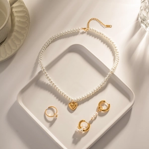 Elegant 18k gold plated pearl necklace set with heart pendant and matching jewelry