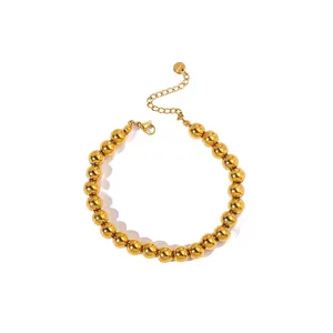 Detail view of 18K gold plated stainless steel bead bracelet with lobster clasp and chain