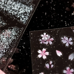 5D Japanese cherry blossom nail stickers with pink flower and petal designs on black base